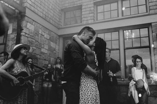 Anson Mount kissing his wife and dancing at the recreation of their wedding