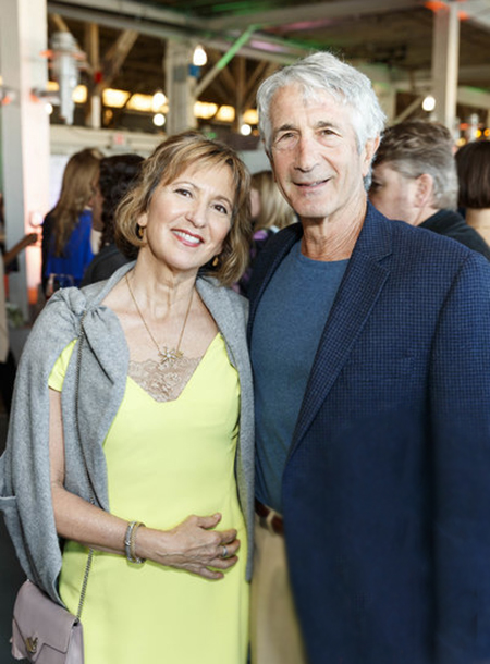 Karen and her husband at one of the public events posing for photographs.