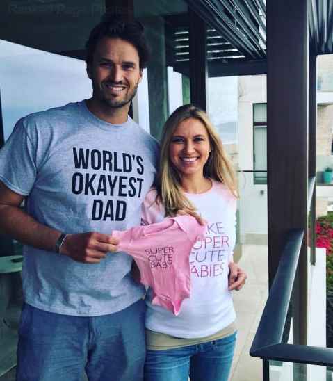 Indra Petersons with her husband announcing her pregnancy via Fcaebook. husband, partner spouse