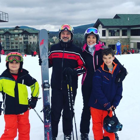 Erica Hill with her husband and children