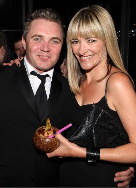 Jennifer Woodburne with her husband, Alex Ferns.