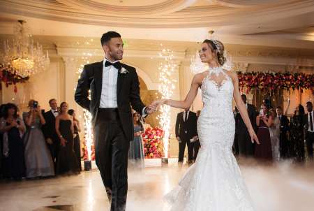Clara Rivera and Mariano Rivera's eldest son, Mariano Rivera Jr. and his bride, Alyssa Picinich dancing at their wedding ceremony