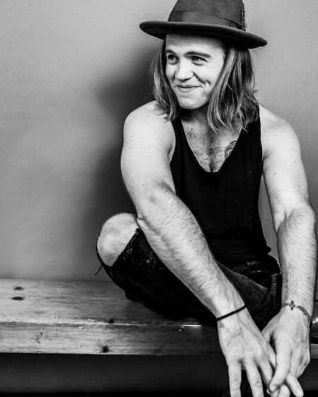 Reilly Dolman is currently single and concentrating on his career