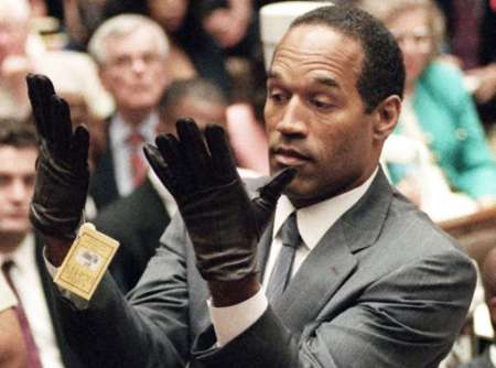 Arnelle Simpson's dad, O. J. Simpson hands up his gloves during the custody trial