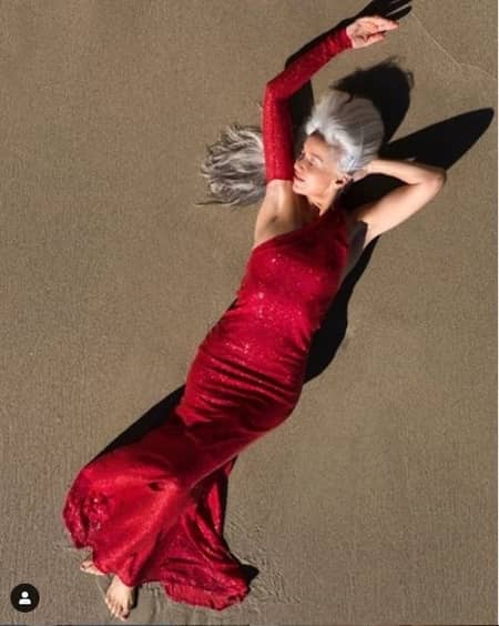 Yasmina posing on the beach for the photoshoot