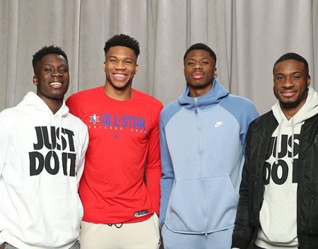 Giannis Antetokounmpo (second from left) with his NBA player brothers Alexa (left), Kostas (second from right), and Thanasis Antetokounmpo (right).