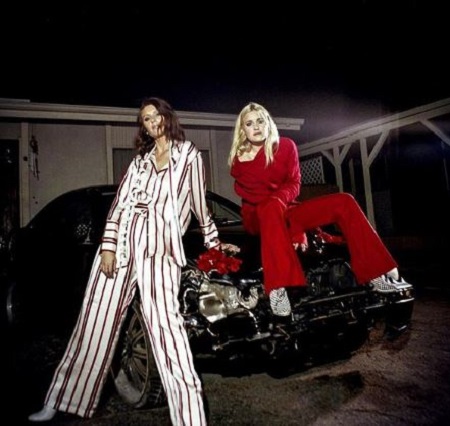  The American actress, singer, AJ Michalka (red dress) has an estimated net worth of around $2 million.