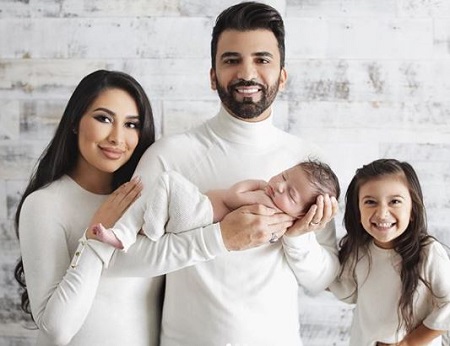 Tamanna and Khushal pictured with their children Aliya (right) and Riyan Aqmal (newly born).