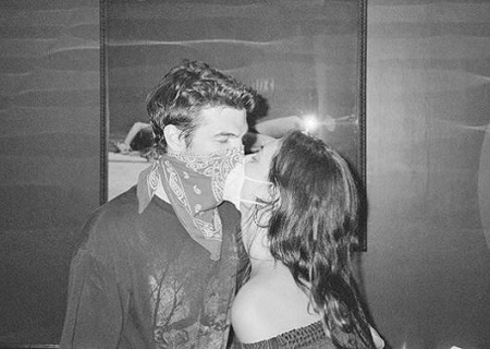 Phoebe Tonkin revealed her relationship with Alex Greenwald via Instagram post.