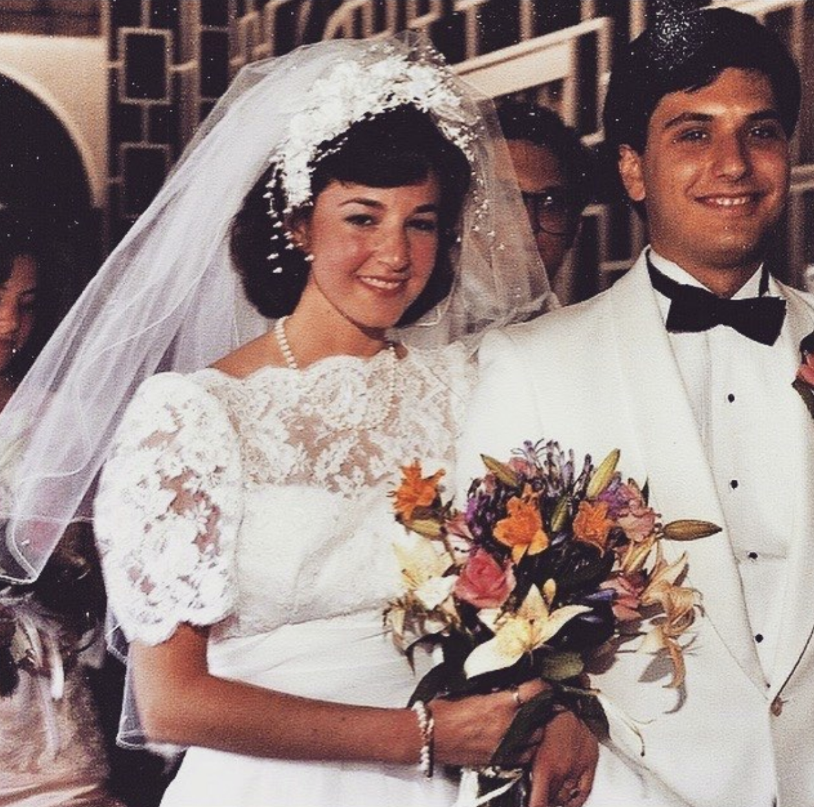 Monica Medina with her handsome husband on their wedding day.