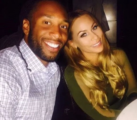 Larry Fitzgerald and Melissa Blakesley.