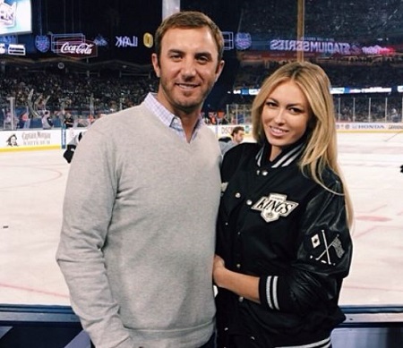  The American golf player Dustin Johnson with his girlfriend-turned-wife Paulina Gretzky.