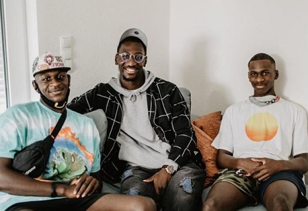 The German basketball player Isaac Bonga (left) with his elder brother Tarsis Bonga (middle) and younger brother Joshua Bonga (right)