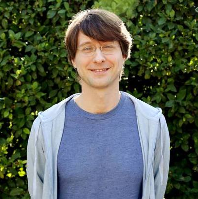 Douglas Lawrence At His Home(standing at garden)