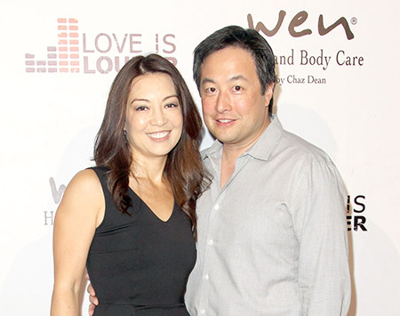 Ming-Na Wen and her husband Eric Zee at Chaz Dean's summer party benefiting Love Is Louder on August 1, 2015 in Los Angeles, California.