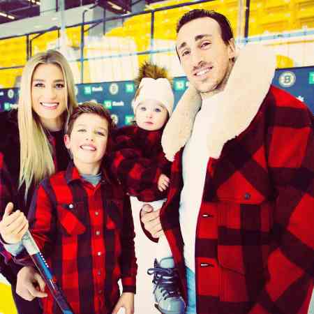 Katrina Sloane and her husband, Brad Marchand with their kids on Christmas Eve. Know more about the married couple's children.