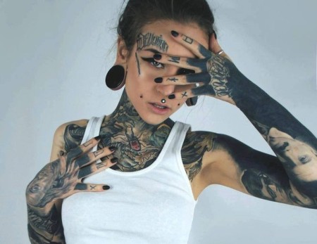 Monami Frost's body is covered with beautiful dark tattoos.