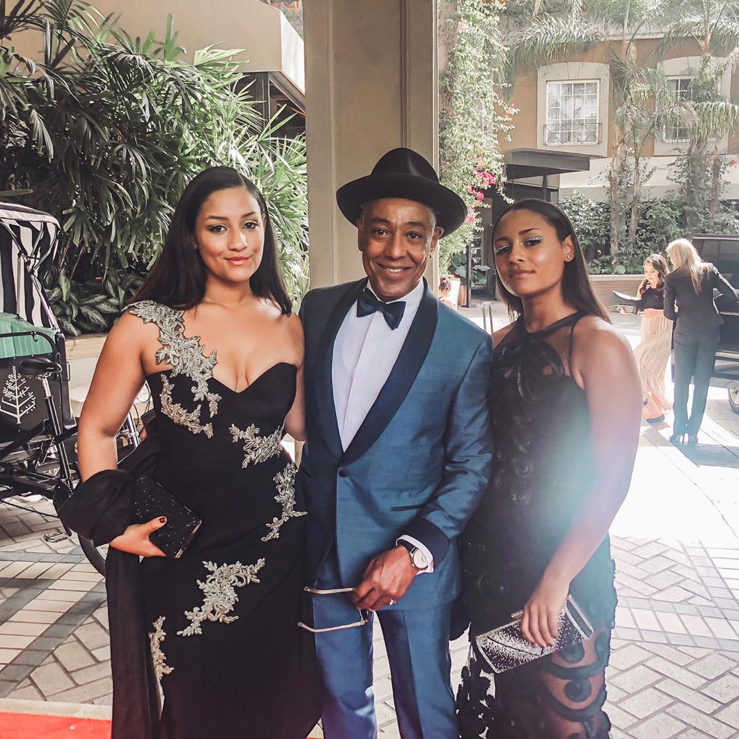 Giancarlo posing with his daiughter during an event