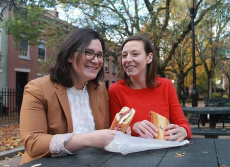 Alison Emma Schumer with her partner Elizabeth Weiland having lunch