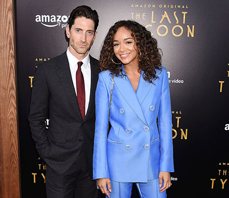 Iddo and Ashley both wears chic suits