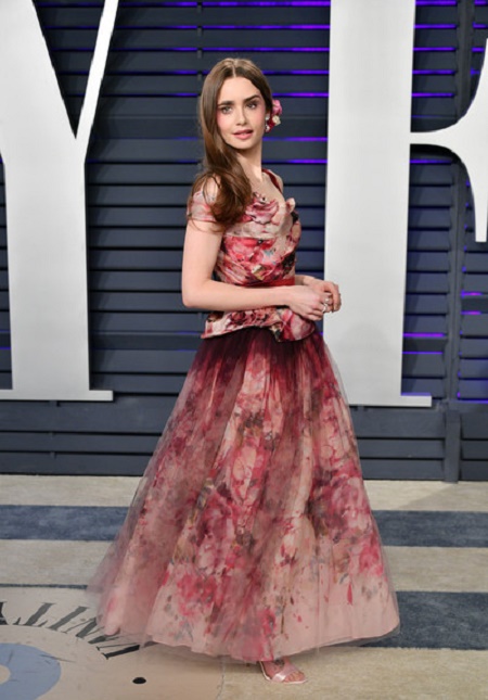 Lily Collins is a 5 feet 5 inches tall actress