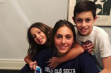 Chris and Cristina's three children at their house