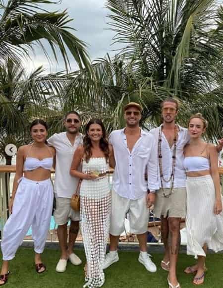 Paul Fisher and Chloe Chapman with their friends before the wedding