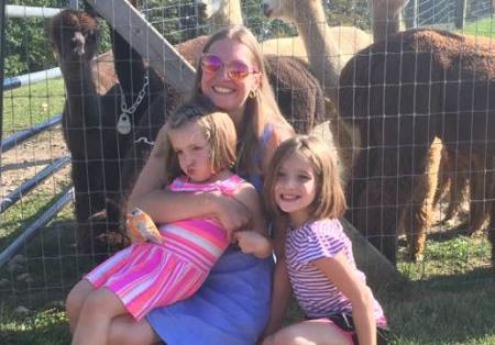 Michael's wife, Maryna and their kids.