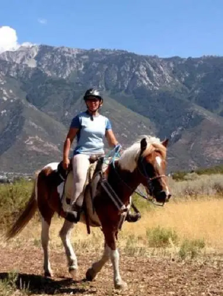 Melanie Olmstead's Riding Her Own Horse Named Mahogany