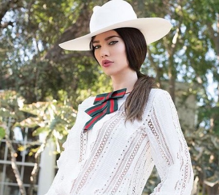 Elan Ruspoli actress wife, Jacqueline MacInnes Wood posing for a photo shoot.