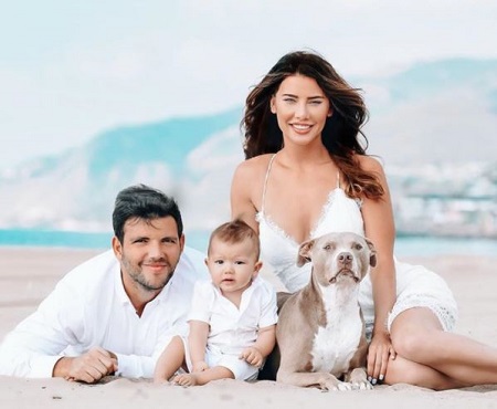 Elan and Jacqueline with their son Rise Harlen Ruspoli and a pet dog.