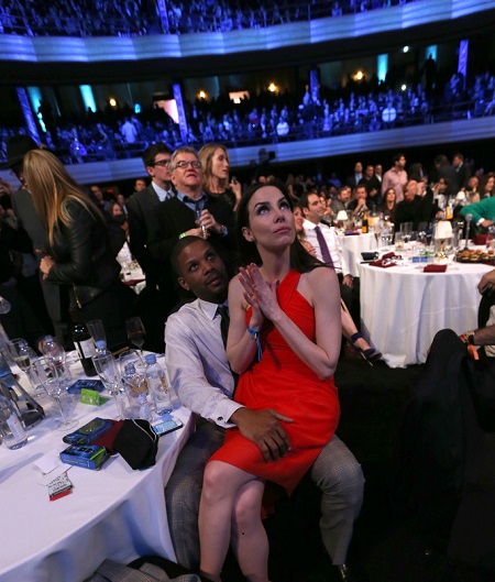 Whitney Cummings and Kerry Rhodes