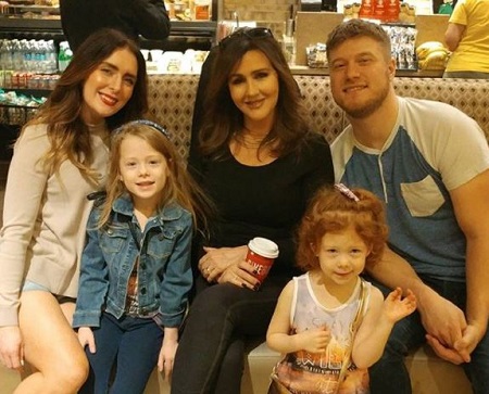 Brittany Stodden with her mother, husband Justin, and two beautiful daughters.