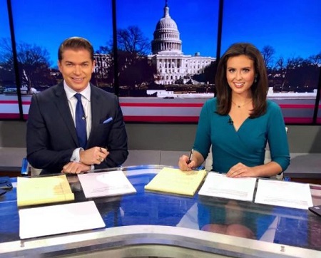 The news reporter Emma Rechenberg serves as co-host of the News Report alongside Shaun Kraisman on News Max.