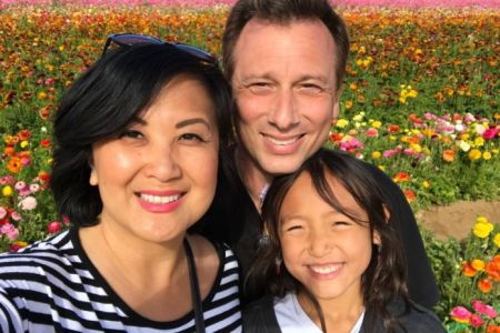 Mai and her late husband, Chris with their daughter, Isabella.