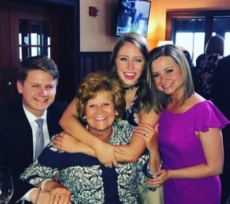  The meteorologist Jennifer Mcdermed (back middle) with her sister Lauren and brother Mark Mcdermed.
