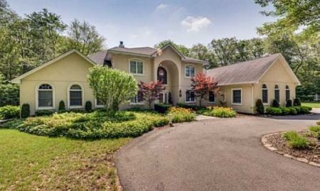 Randy owned a house  in Rhode Island.