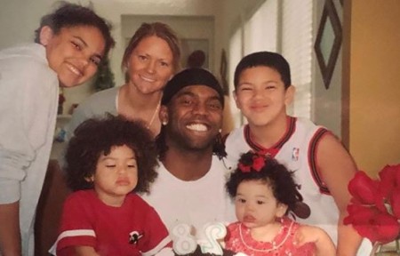 Randy and his ex-girlfriend with their kids.