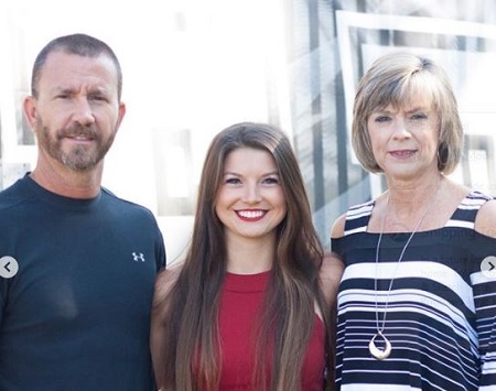Hannah Barron with her mother Lisa Barron and father Jeff Barron.