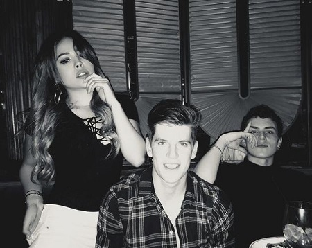 The Mexican actress, Danna Paola, with the Elite co-actors, Miguel Bernardeau (middle), Aaron Piper (right)