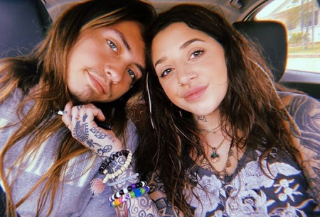 The American singer, Landon Cube with his girlfriend, Liltiny.