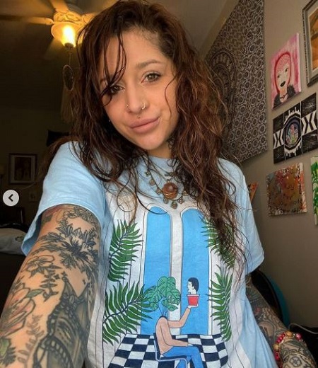 The tattoo artist Liltiny runs a clothing brand named, 'Sapphire Clothing Brand.