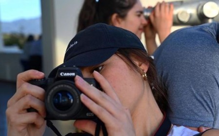 Elisha Applebaum clicking a snap.