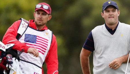 Kessler Karain works as the caddie of his brother-in-law.