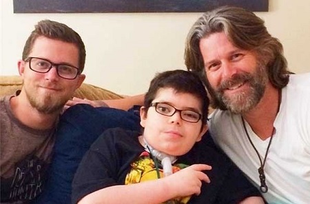  Grayson Smiley (middle) with his father, Slade Smiley, and big brother, Gavin Smiley. 