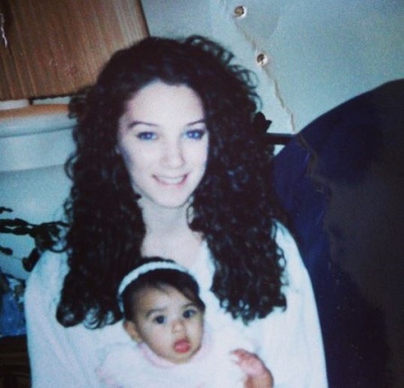 : The childhood image of Ally Lotti, aka Alexia Lotti, with her mother