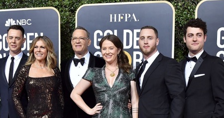 Truman Hanks (right) with his parents, brother Chet Hanks (left), and half-siblings, Elizabeth (third from right), Colin Hanks (second from right).