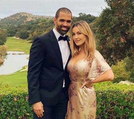 Cottrell Guidry and Kimberly Steinberg pictured at their friend's wedding reception.