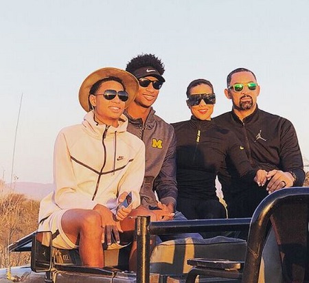 Jenine Howard with her husband, Juwan, and sons, Jace (second from left), Jett Howard (left).