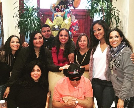 Asaad Ali with his half-sisters and father Muhammed.